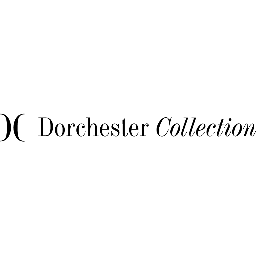 Logótipo da Dorchester Collection, com as letras estilizadas «DC» e o nome completo numa fonte sofisticada.