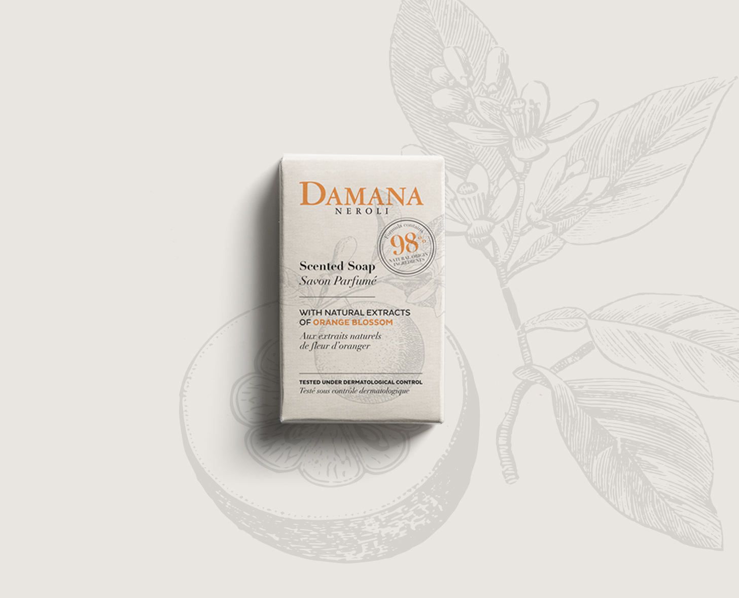 Eine Schachtel mit Damana Neroli mit natürlichen Extrakten aus Orangenblüten und einer floralen Hintergrundillustration.