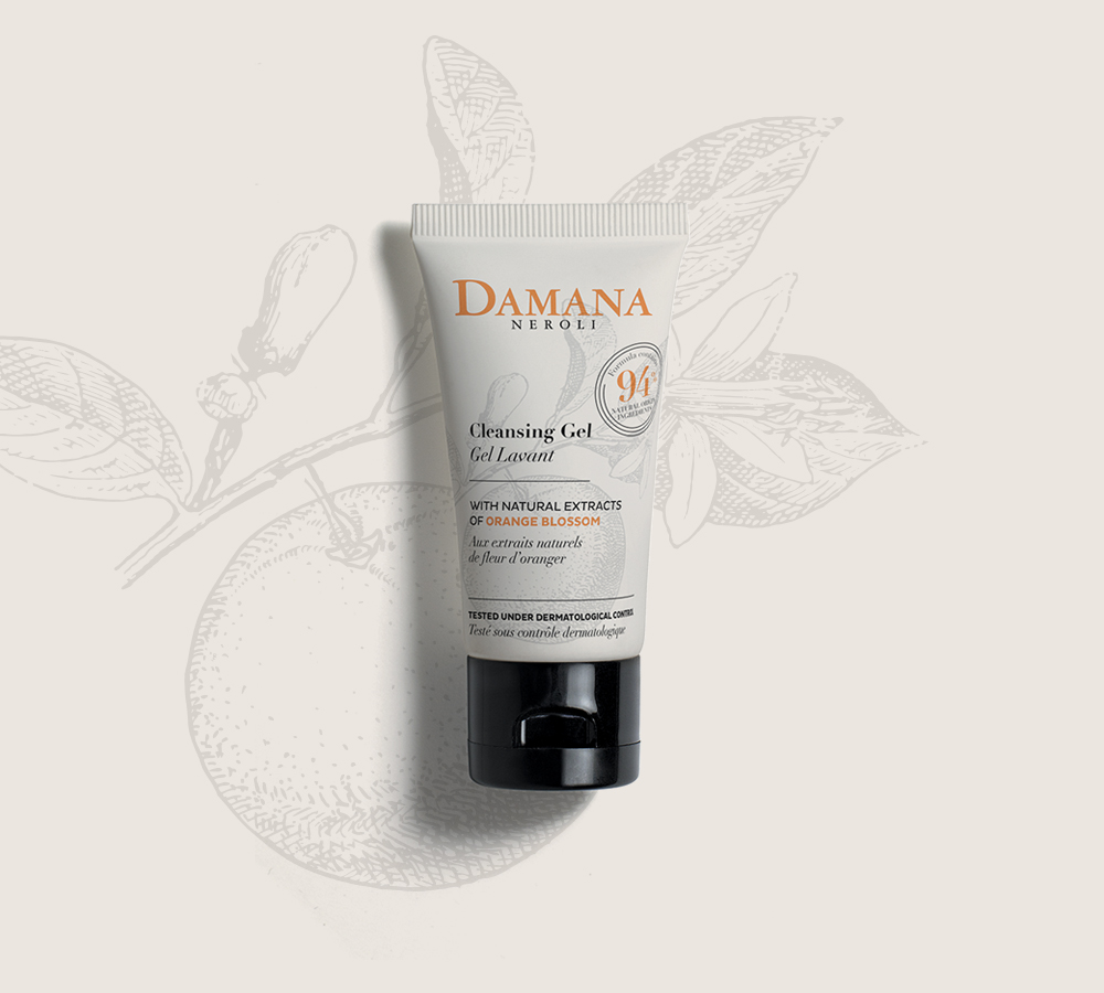 Eine Tube Damana Neroli Gel mit natürlichen Extrakten aus Orangenblüten, in einem klaren und minimalistischen Design. Der Hintergrund ist mit einer dezenten Illustration einer Orange verziert.