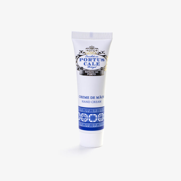 Un tubetto bianco di crema per le mani con elementi decorativi blu e l'etichetta "Portus Cale" e "Creme de Mãos".
