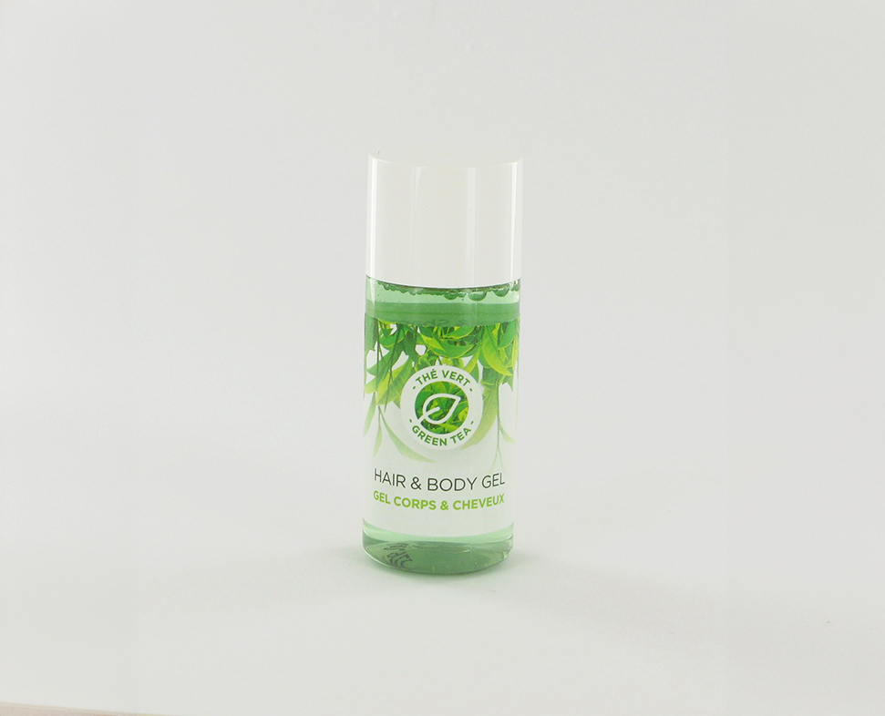 Um frasco plástico transparente de gel verde para cabelo e corpo com uma tampa branca, rotulado como «The Very Green Tea».