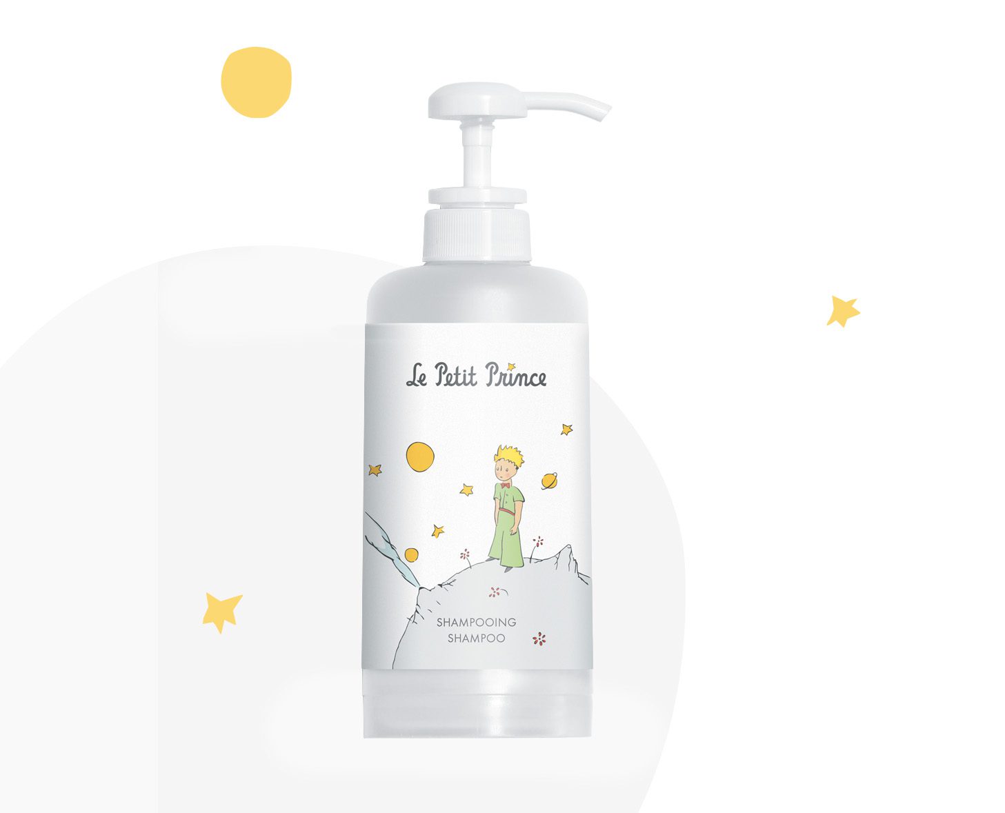 Eine durchsichtige Shampooflasche mit einer Illustration eines kleinen Prinzen inmitten von Sternen und Planeten und den AufschriftenLe Petit Prince“ und „Shampooing“ auf dem Etikett.