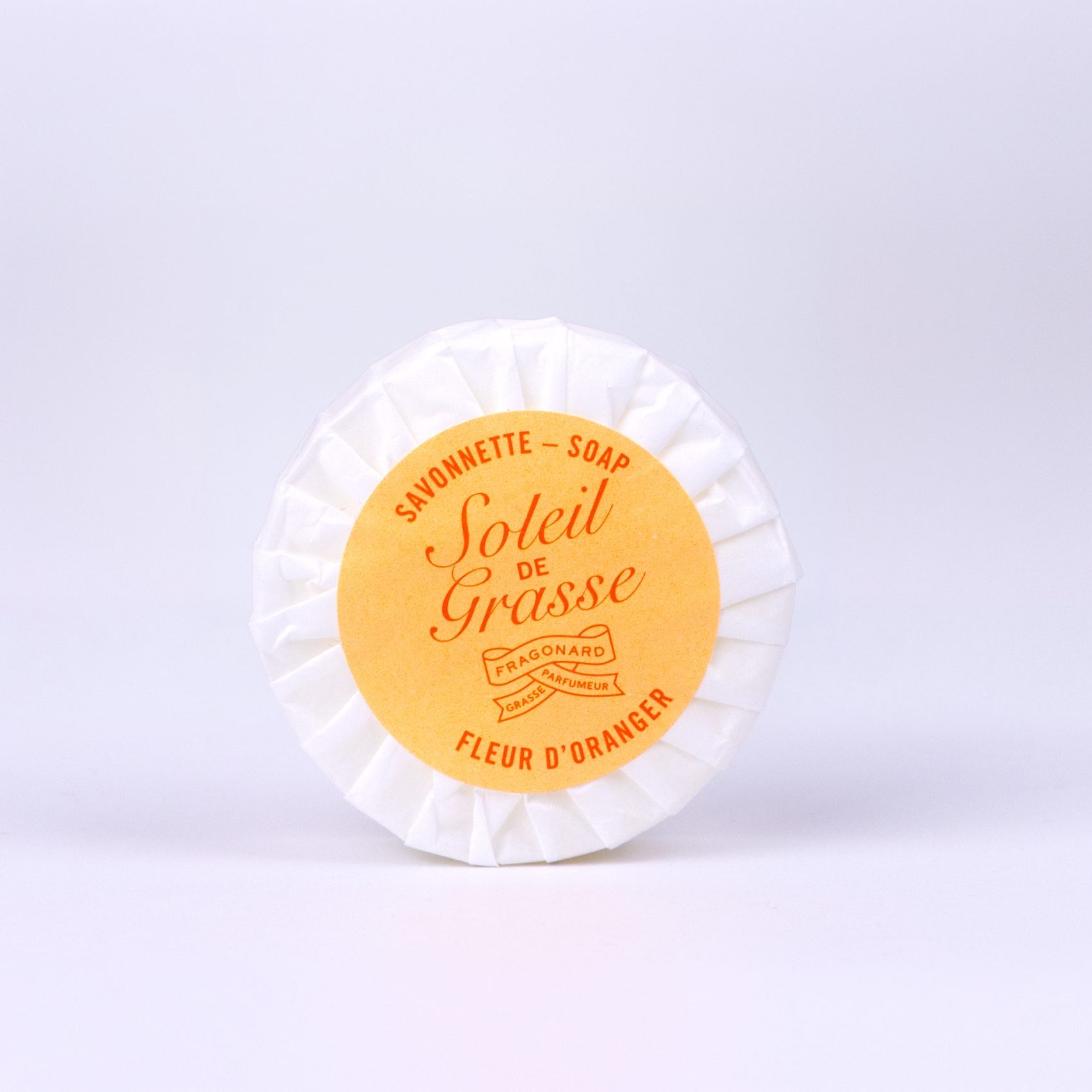 Wrapped Soleil de Grasse soap by Fragonard, delicately scented with orange blossom.